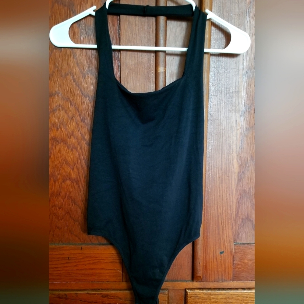 NWT Free People intimately halter bodysuit.Super soft and stretchy.  Women's M/L